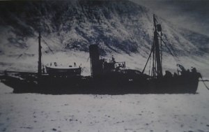 The steam powered whale catcher Southern Cross tethered to the mooring buoy. From inventory of Southern Cross Whaling Co in 1915.