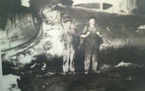 Mr Johannesson Snr with factory blacksmith posing in front of a Southern Right Whale